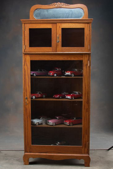 Appraisal: Antique oak triple door Bookcase circa with adjustable shelves and