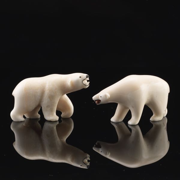 Appraisal: TWO CARVED WALRUS TUSK POLAR BEAR FIGURINES x x Two