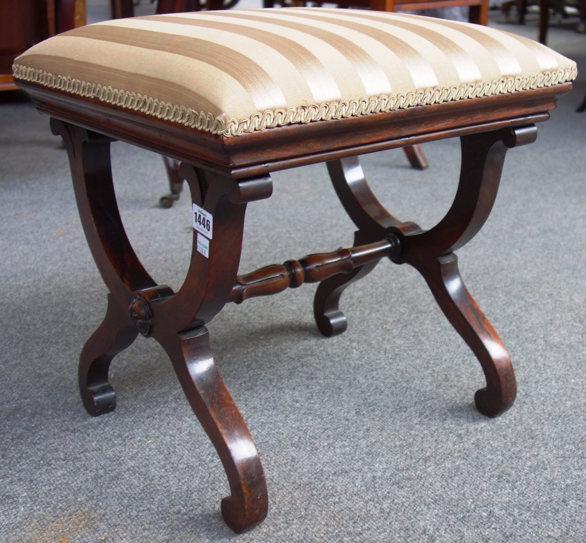 Appraisal: A small rosewood framed square footstool on 'X' frame supports