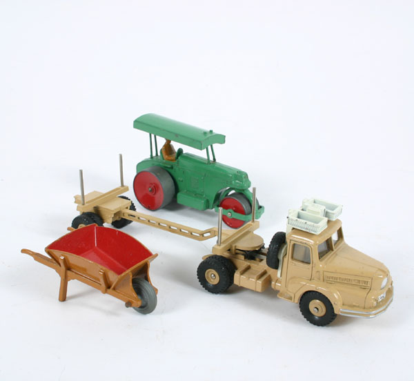 Appraisal: Dinky toy construction equipment asphalt roller wheelbarrow and log truck