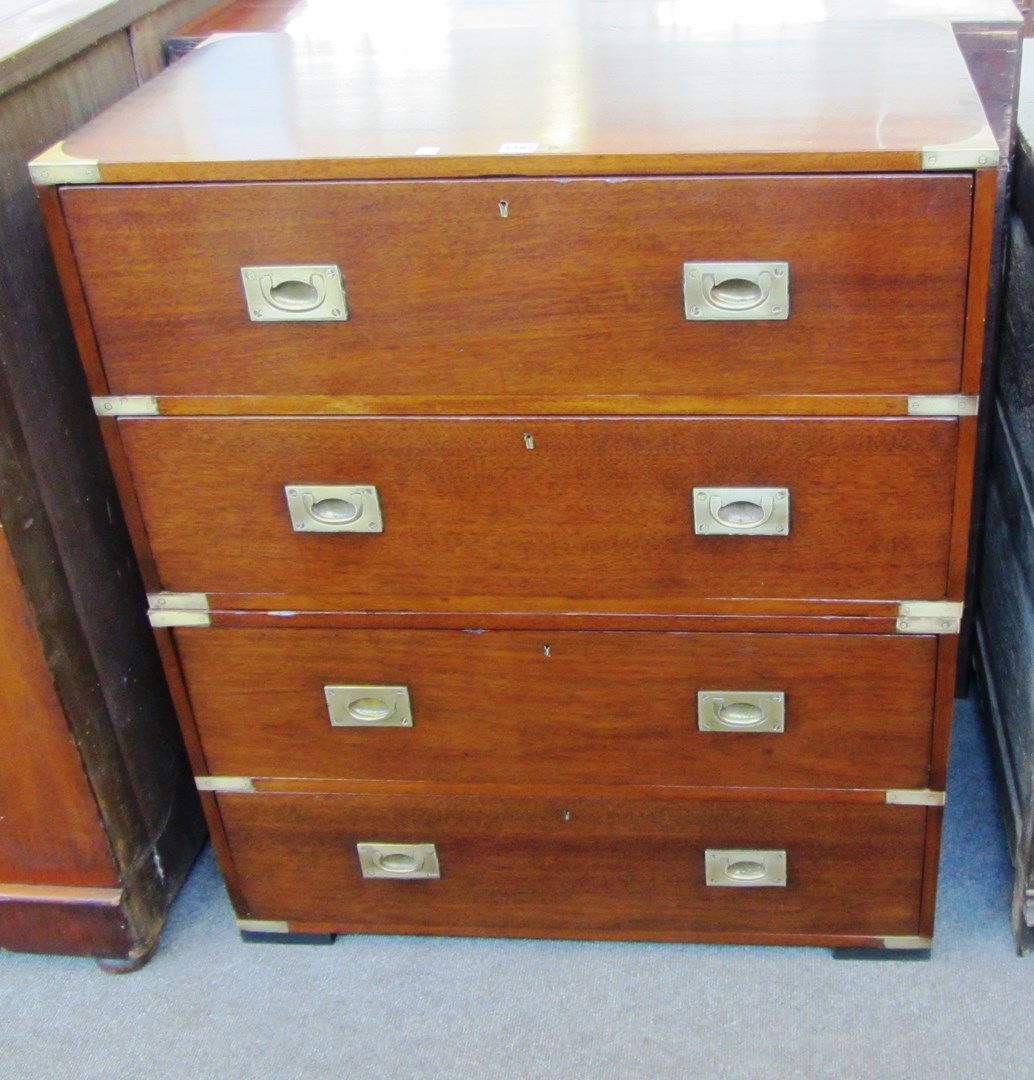 Appraisal: A late th century brass bound teak four drawer two