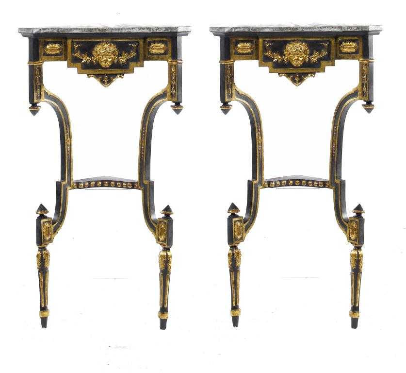 Appraisal: A PAIR OF NORTH ITALIAN PARCEL GILT EBONISED CORNER STANDS