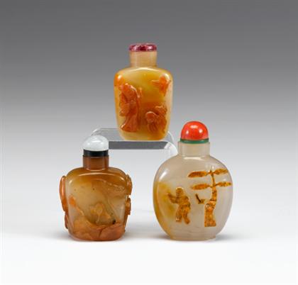 Appraisal: Three Chinese cameo agate snuff bottles th century and later