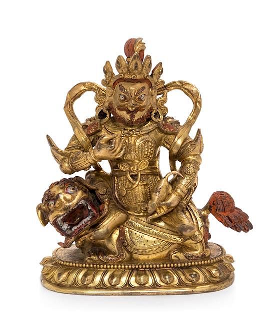 Appraisal: A Sino-Tibetan Gilt Bronze Figure of Kubera Height inches A