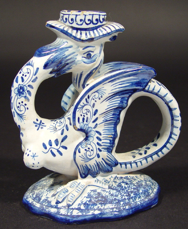 Appraisal: Delft candlestick modelled as a bird hand painted in blue