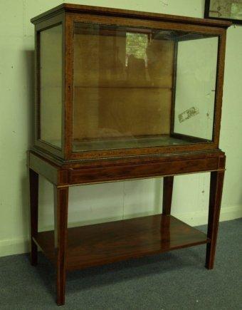 Appraisal: A th Century walnut and inlaid display case the upper