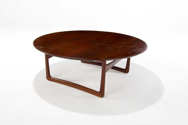 Appraisal: FINN JUHL FRANCE DAVERKOSEN Teak coffee table with corseted stretchers