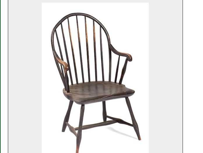 Appraisal: BLACK PAINTED SEVEN-SPINDLE SACK-BACK WINDSOR ARMCHAIR PROBABLY PENNSYLVANIA