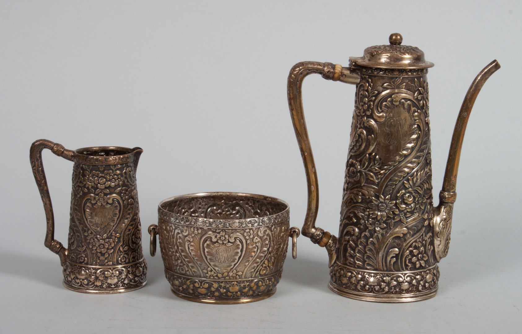 Appraisal: Tiffany repousse sterling dessert coffee set late th century Tiffany