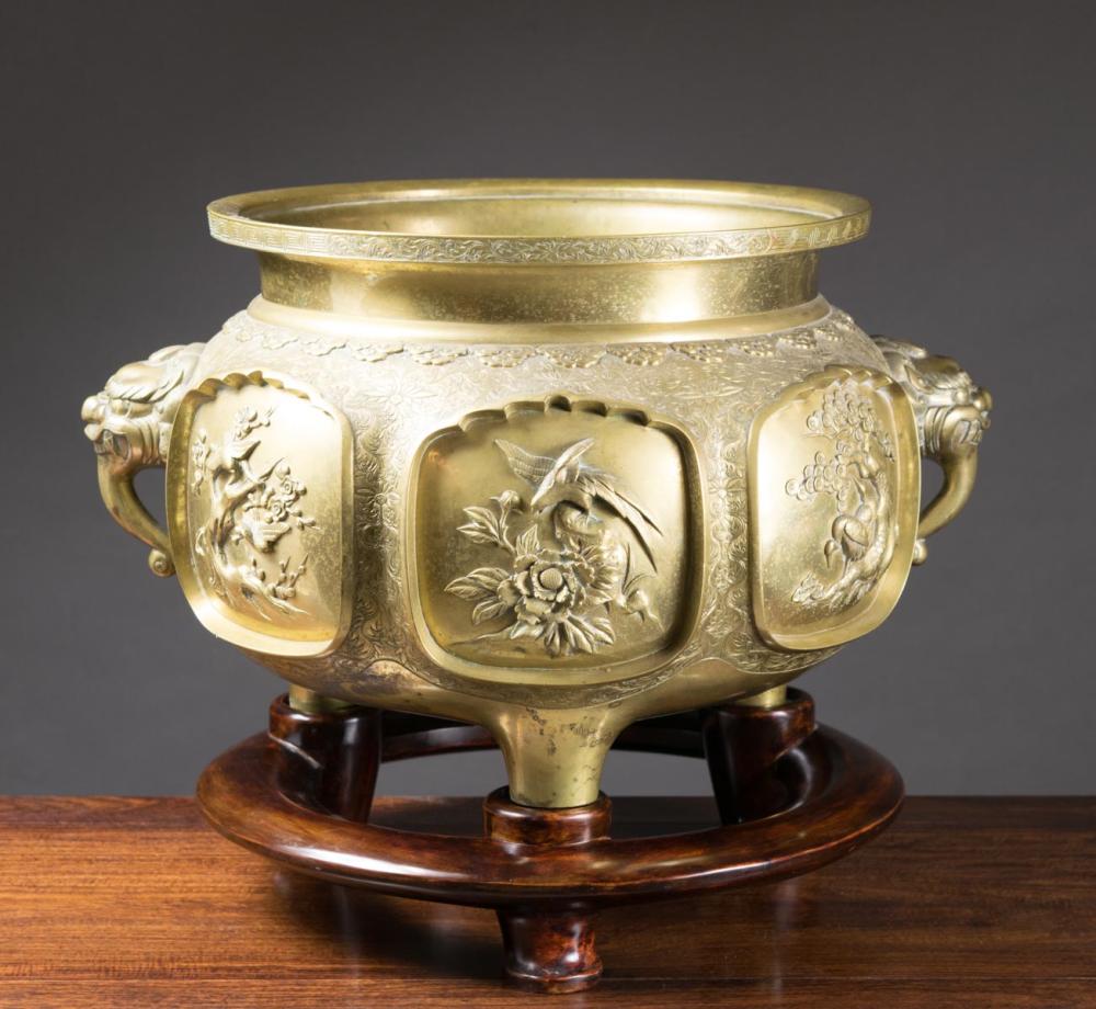 Appraisal: CHINESE BRASS FOOTED JARDINIERE with gargoyle handles and featuring six