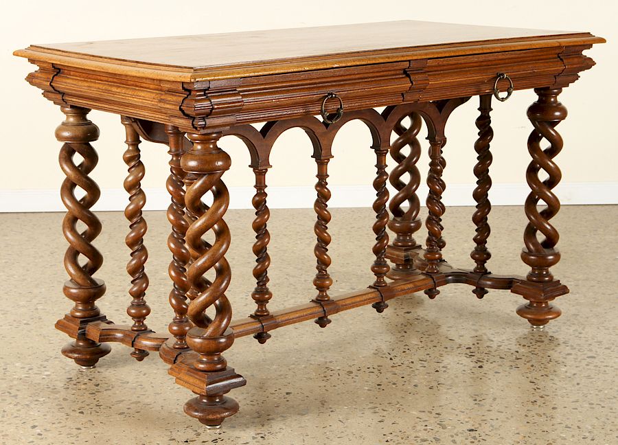 Appraisal: UNUSUAL CONTINENTAL WALNUT WRITING TABLE C An unusual Continental walnut