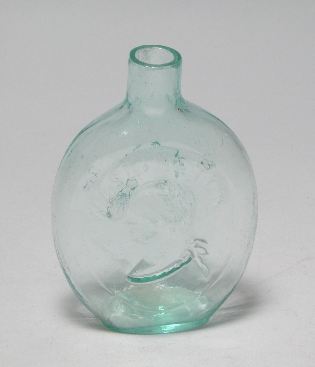 Appraisal: TWO BLOWN MOLDED AQUA GLASS FLASKS American th CenturyOne depicting