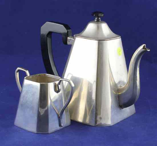 Appraisal: An Indian white metal teapot and sugar bowl of conical