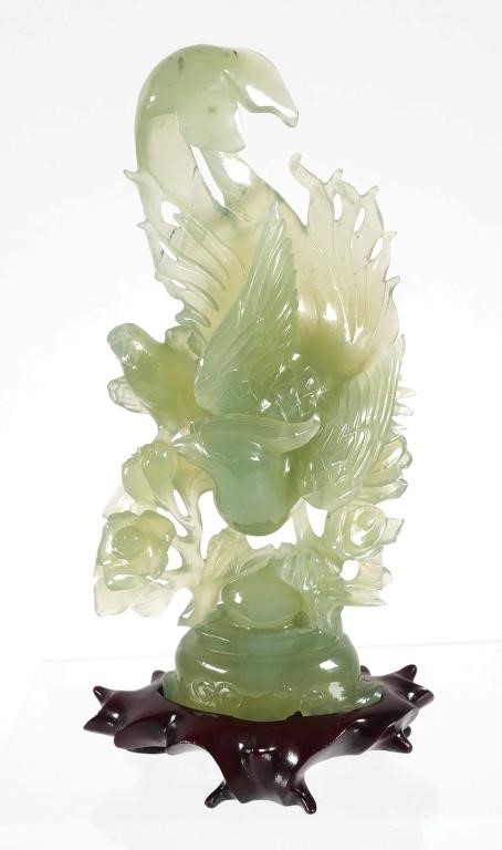 Appraisal: Faux jade hardstone carving of bird measuring high on carved