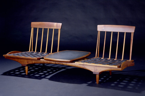 Appraisal: PHILLIP LLOYD POWELL Walnut seating unit with two canvas-webbed seats