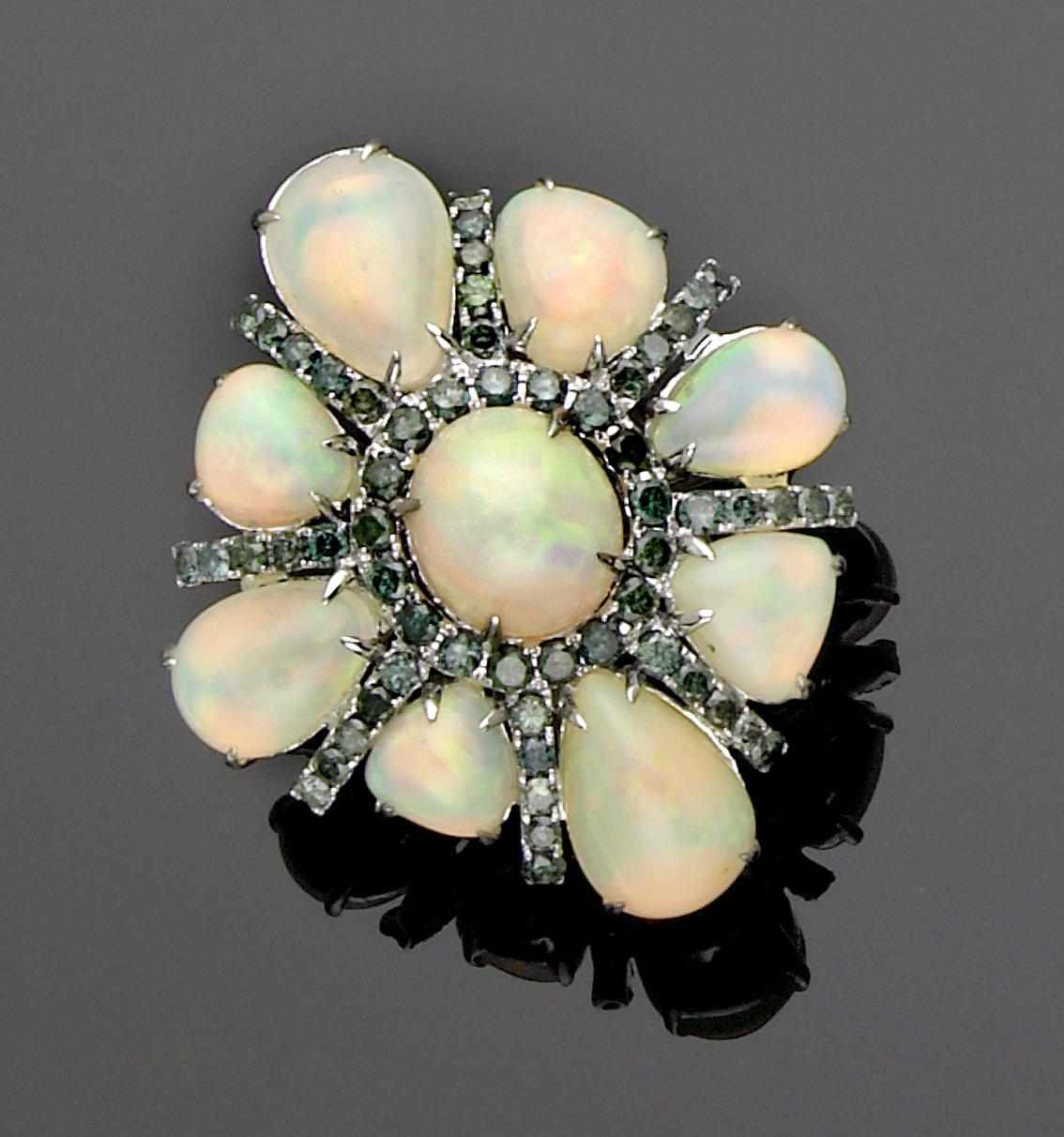 Appraisal: Opal and Blue Diamond Ring Featuring nine cabochon opals from