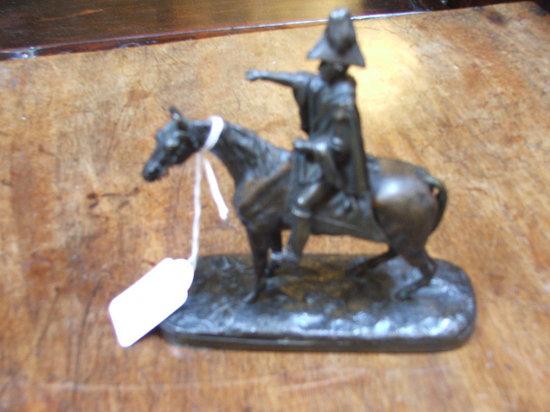 Appraisal: A BRONZE DUKE OF WELLINGTON ON HORSEBACK on a naturalistic