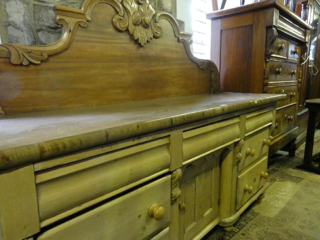 Appraisal: A Victorian stripped pine Lancashire kitchen dresser fitted with arrangement