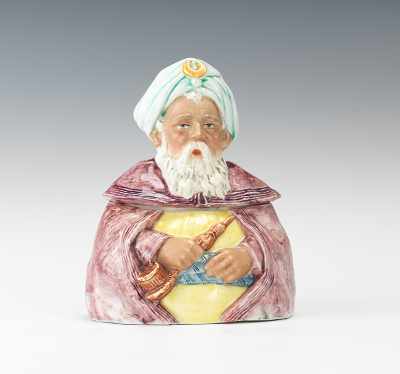 Appraisal: A Majolica Arab Man Figural Tobacco Jar Porcelain with polychrome