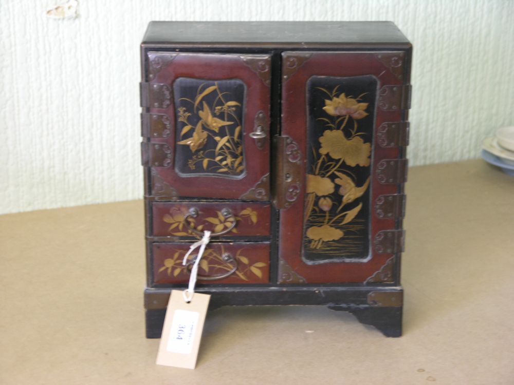 Appraisal: A late th century Japanese lacquered table top cabinet the