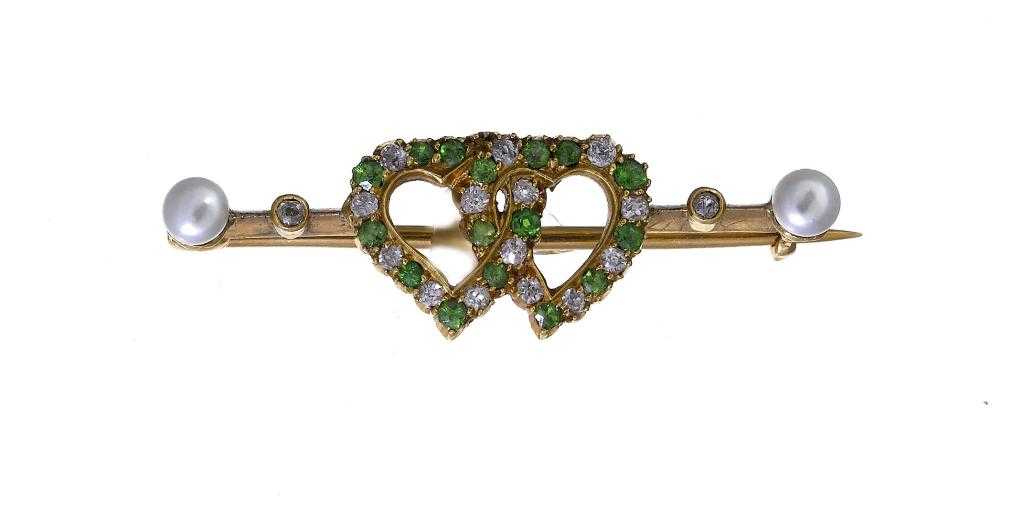 Appraisal: A DIAMOND DEMANTOID GARNET AND CULTURED PEARL LINKED HEARTS BAR