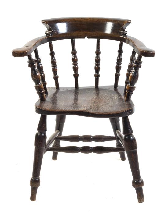 Appraisal: Sale Lot An English Yew Wood Captain's Chair the horseshoe