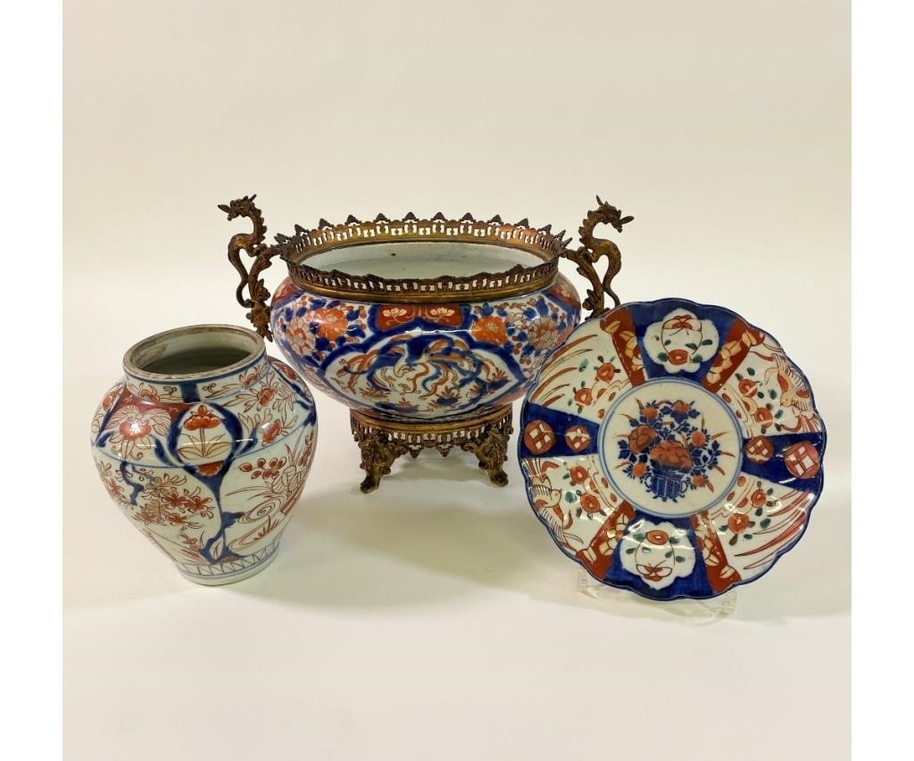 Appraisal: Japnaese Imari centerpiece bowl with gilt metal mounts with dragons