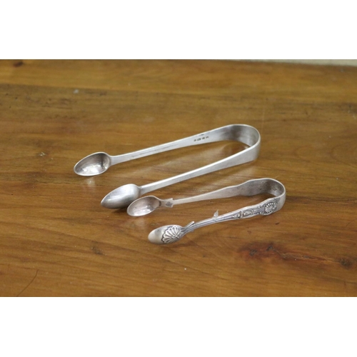 Appraisal: Two pairs of silver sugar nips approx grams