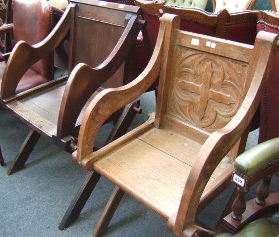 Appraisal: A Gothic revival light oak Glastonbury style chair with peg