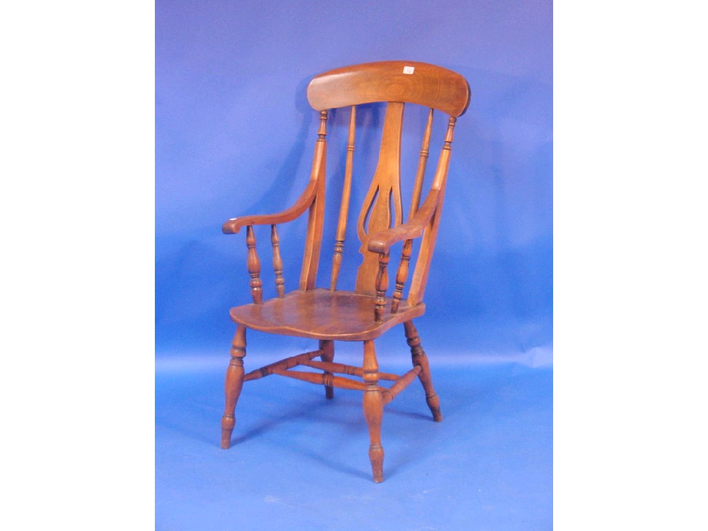 Appraisal: A Victorian beech and elm Windsor type chair with pierced