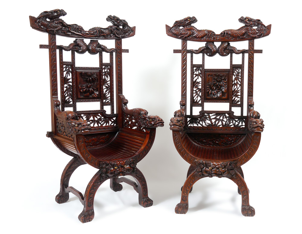 Appraisal: PAIR PROFUSELY CARVED ORIENTAL DRAGON CHAIRS Carved all over with