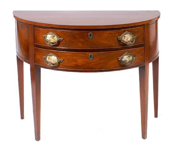 Appraisal: A Directoire style plum pudding mahogany demilune commode height in