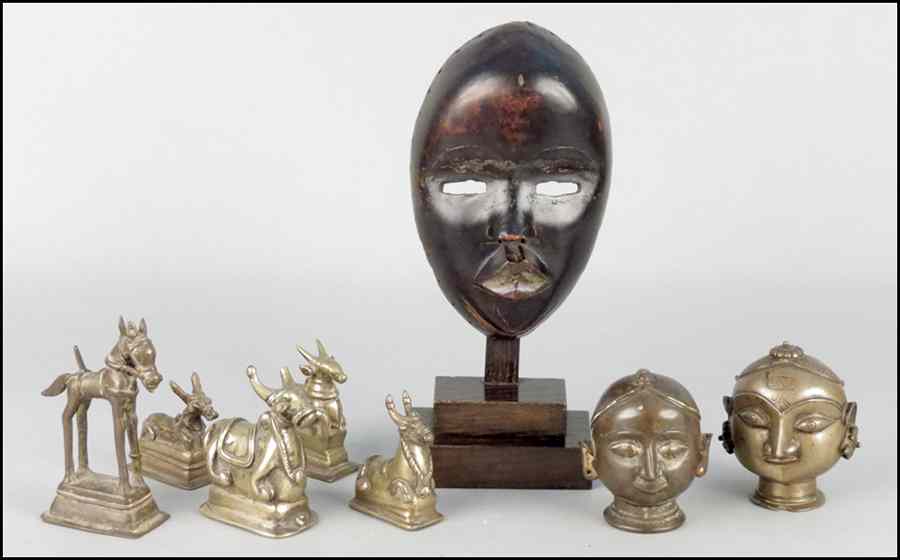 Appraisal: AFRICAN CARVED WOOD MASK Together with a collection of various