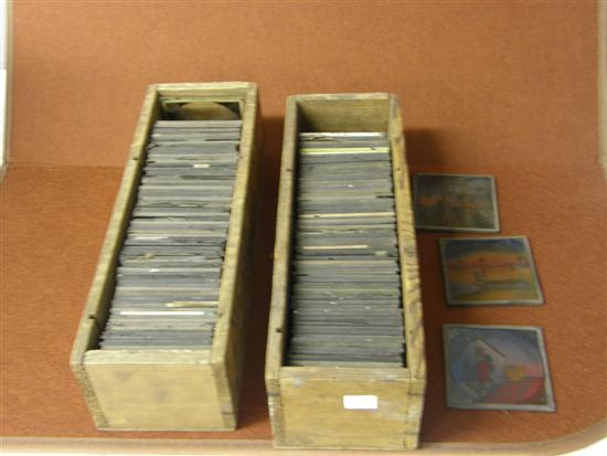 Appraisal: Two boxes of magic lantern slides They are of mixed