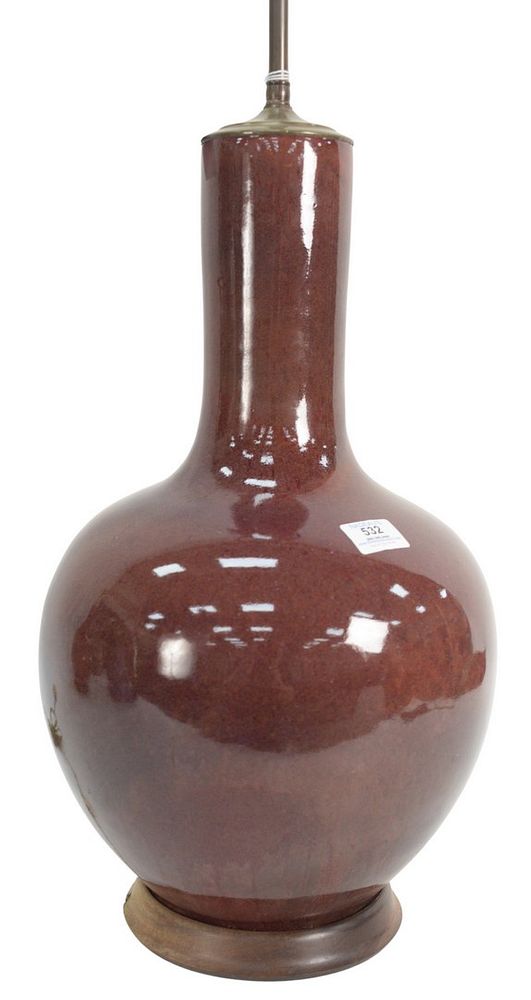 Appraisal: Chinese Maroon Flambe Glazed Porcelain Vase in globular form with