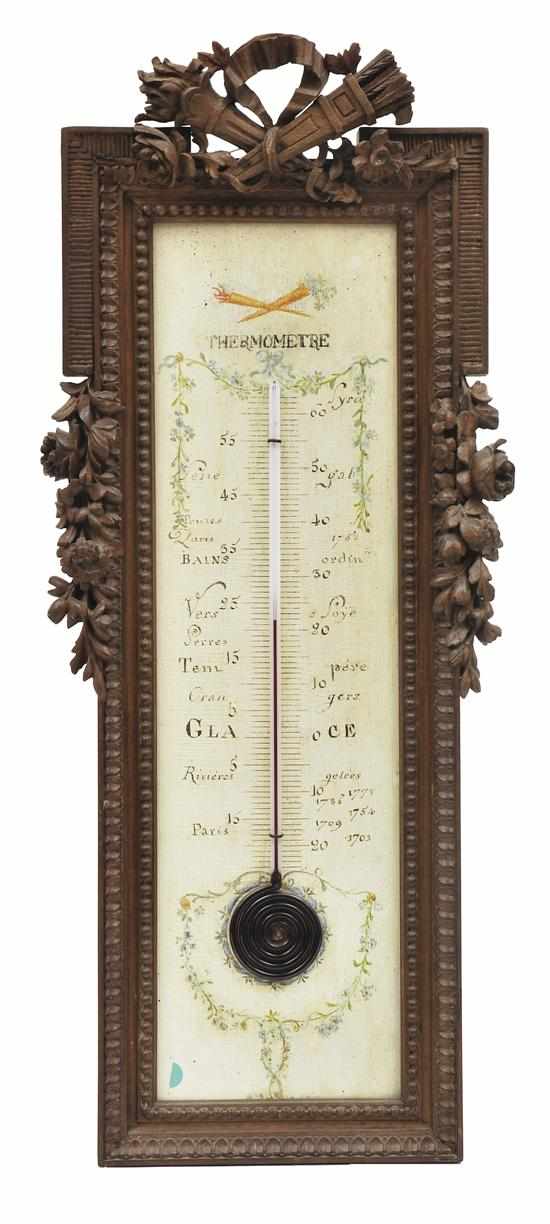 Appraisal: A FRENCH ROSEWOOD CASED THERMOMETER The painted and calibrated gauge