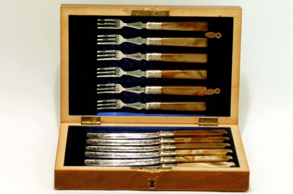 Appraisal: A cased fruit set Comprised of six - forks and