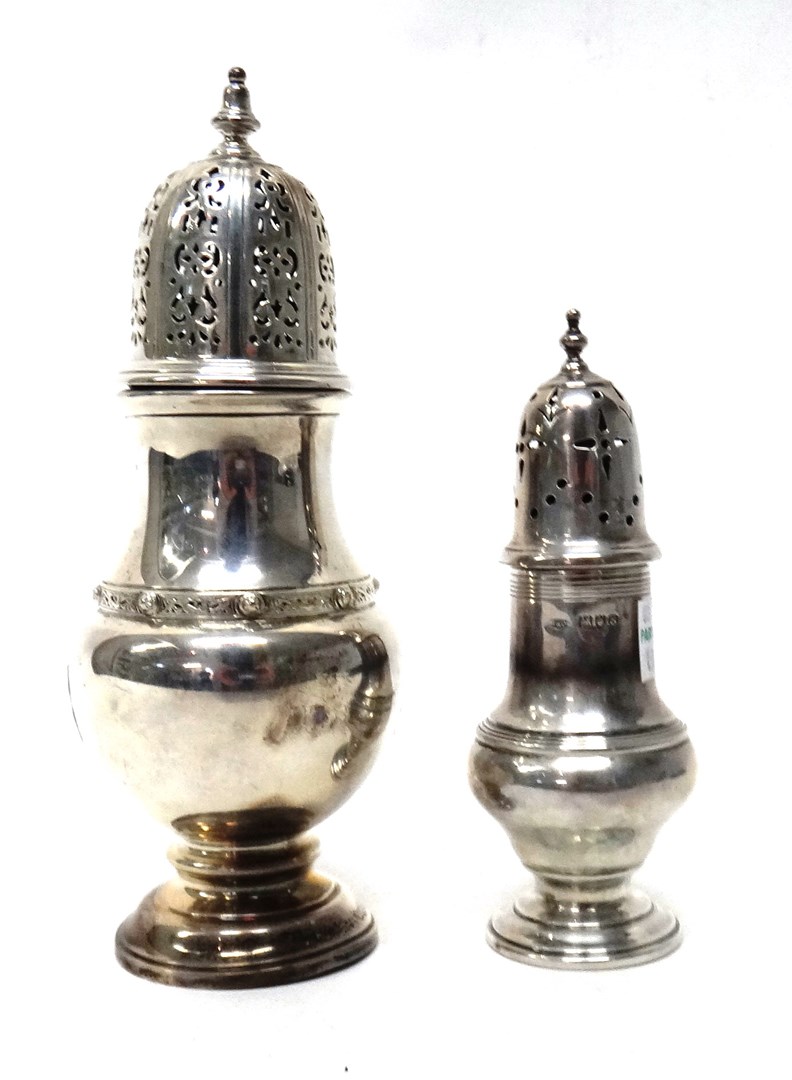 Appraisal: A silver sugar caster of bulbous form decorated with a