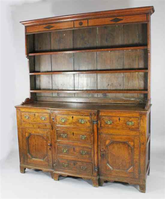 Appraisal: A late th century North Wales oak breakfront dresser fitted