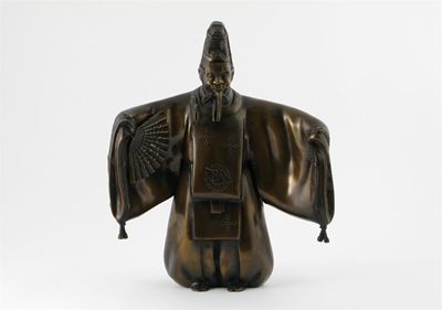 Appraisal: A Japanese bronze model of an actor standing with his