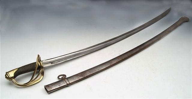 Appraisal: A TH CENTURY SWORD with brass hilt in original scabbard