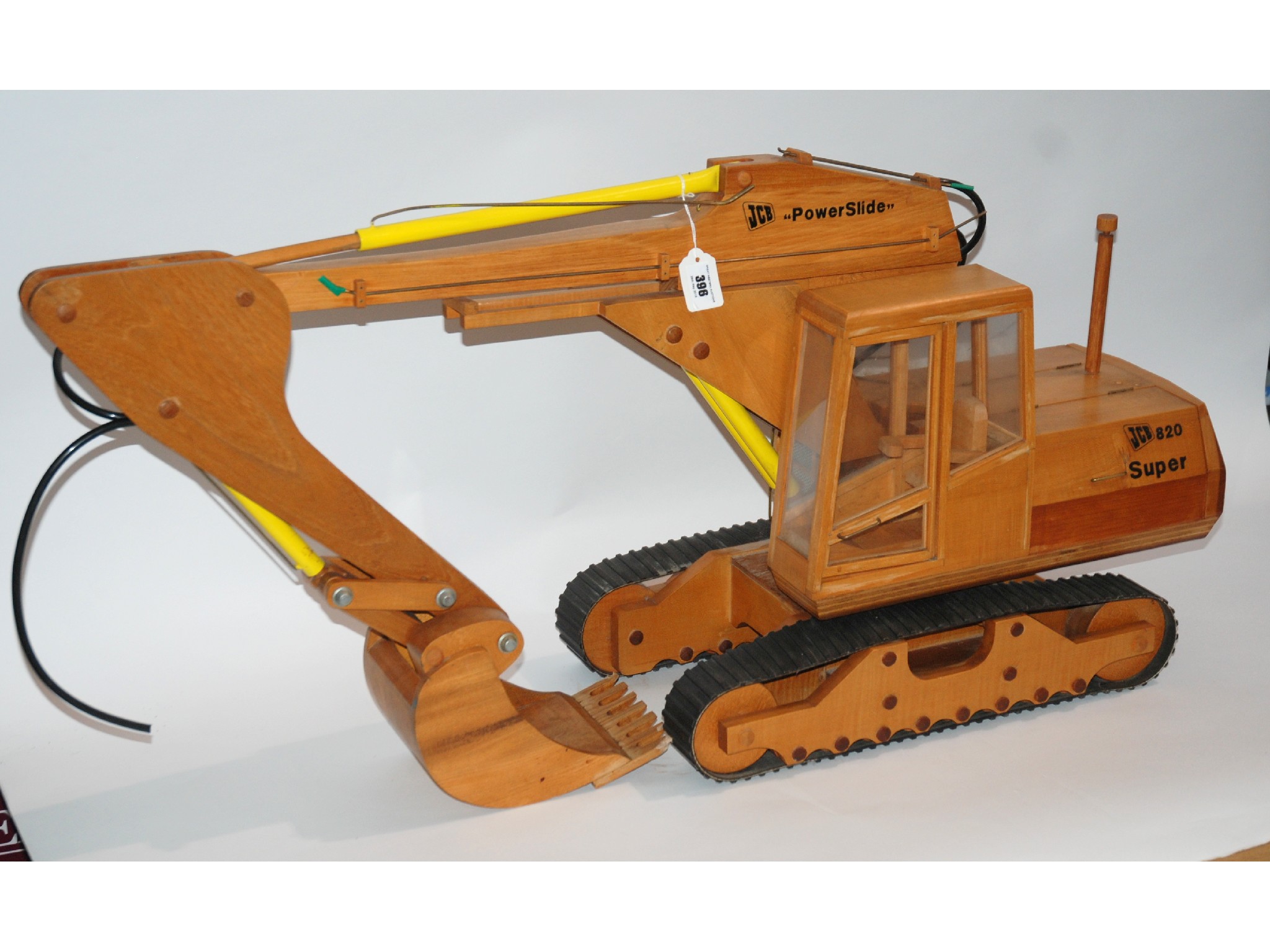 Appraisal: A large wooden JCB digger toy