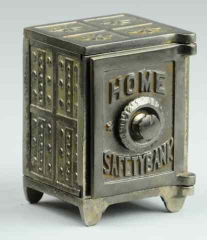 Appraisal: a HOME SAFE STILL BANK Nickel finish cast iron embossed