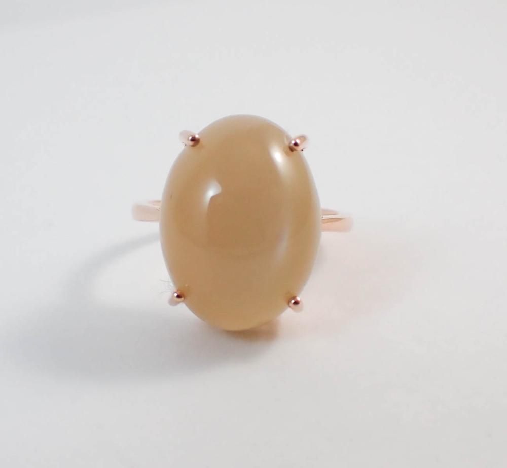 Appraisal: PEACH CAT'S EYE MOONSTONE AND FOURTEEN KARAT ROSE GOLD RING