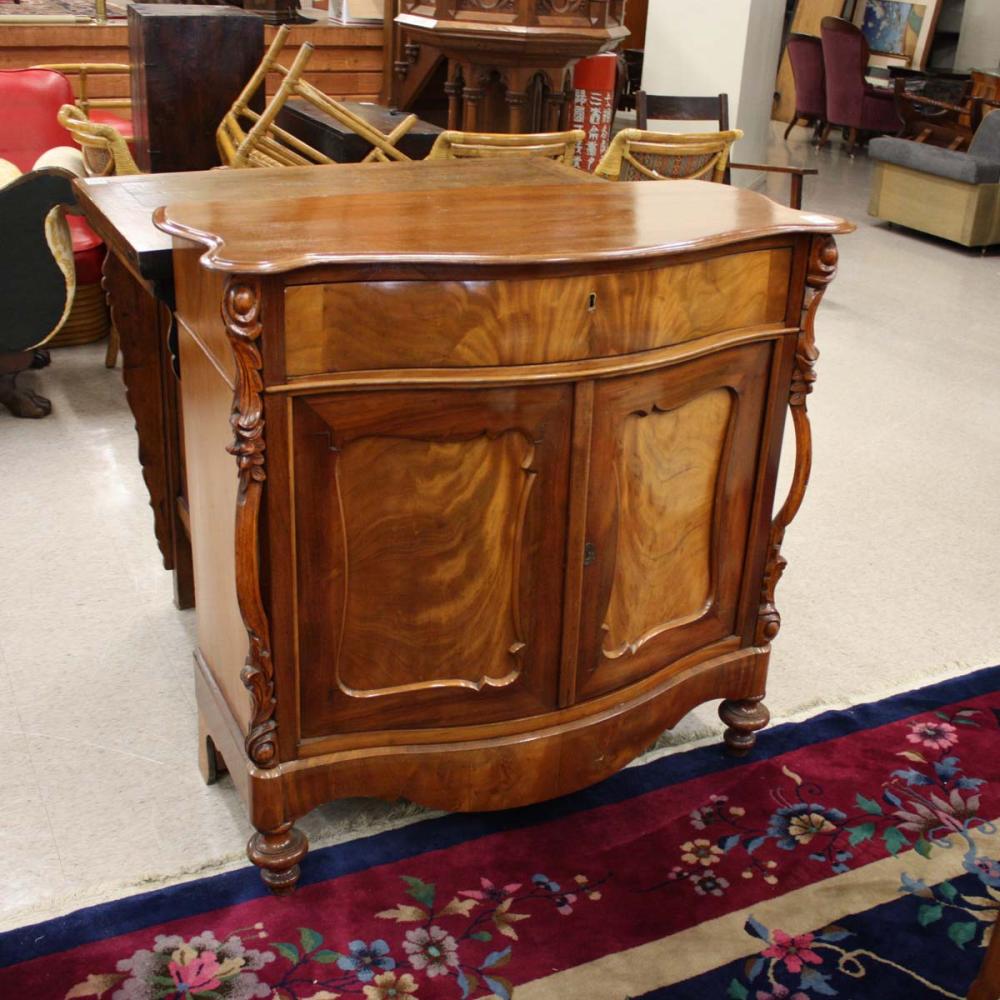 Appraisal: VICTORIAN MAHOGANY CONSOLE CABINET Continental th century the serpentine front