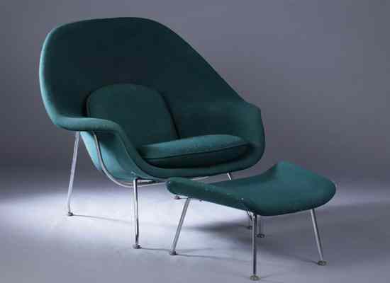 Appraisal: EERO SAARINEN WOMB CHAIR WITH MATCHING OTTOMAN Forest green upholstery