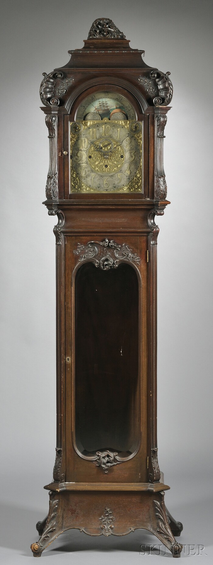 Appraisal: Mahogany Quarter-Chiming Tall Clock Elite Germany c the decoratively carved