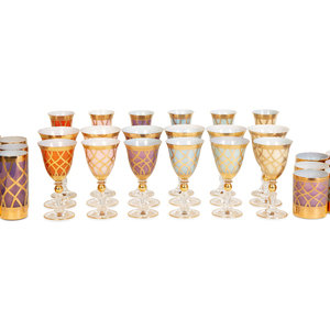 Appraisal: A Set of Polychrome Cased Glass Stemware th Century comprising