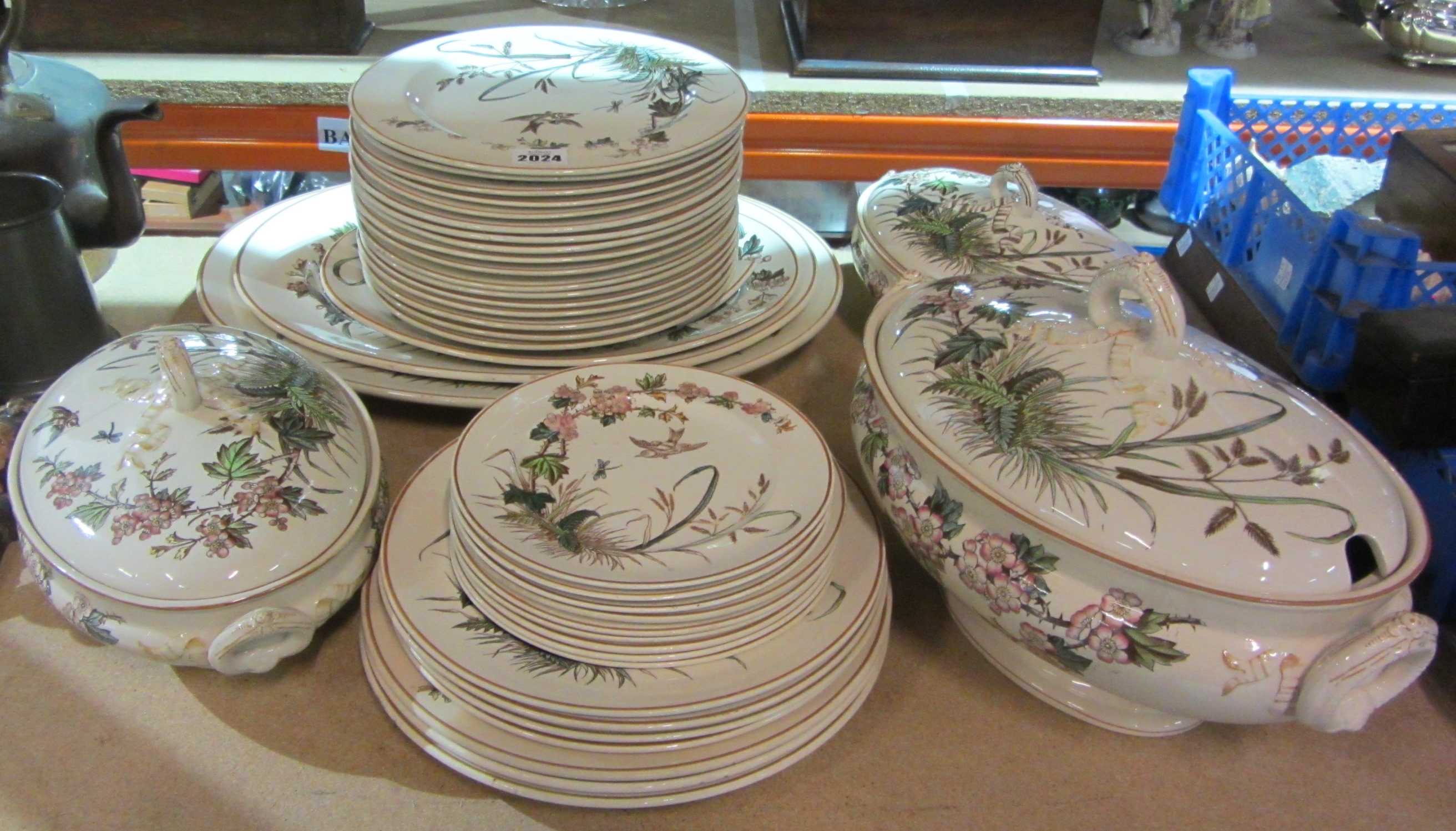 Appraisal: A pottery dinner service 'Hawthorn Pattern'