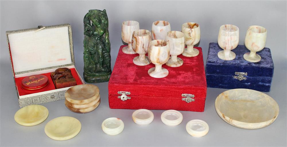 Appraisal: GROUP OF INTERNATIONAL SOFT STONE CARVINGS including a red velvet